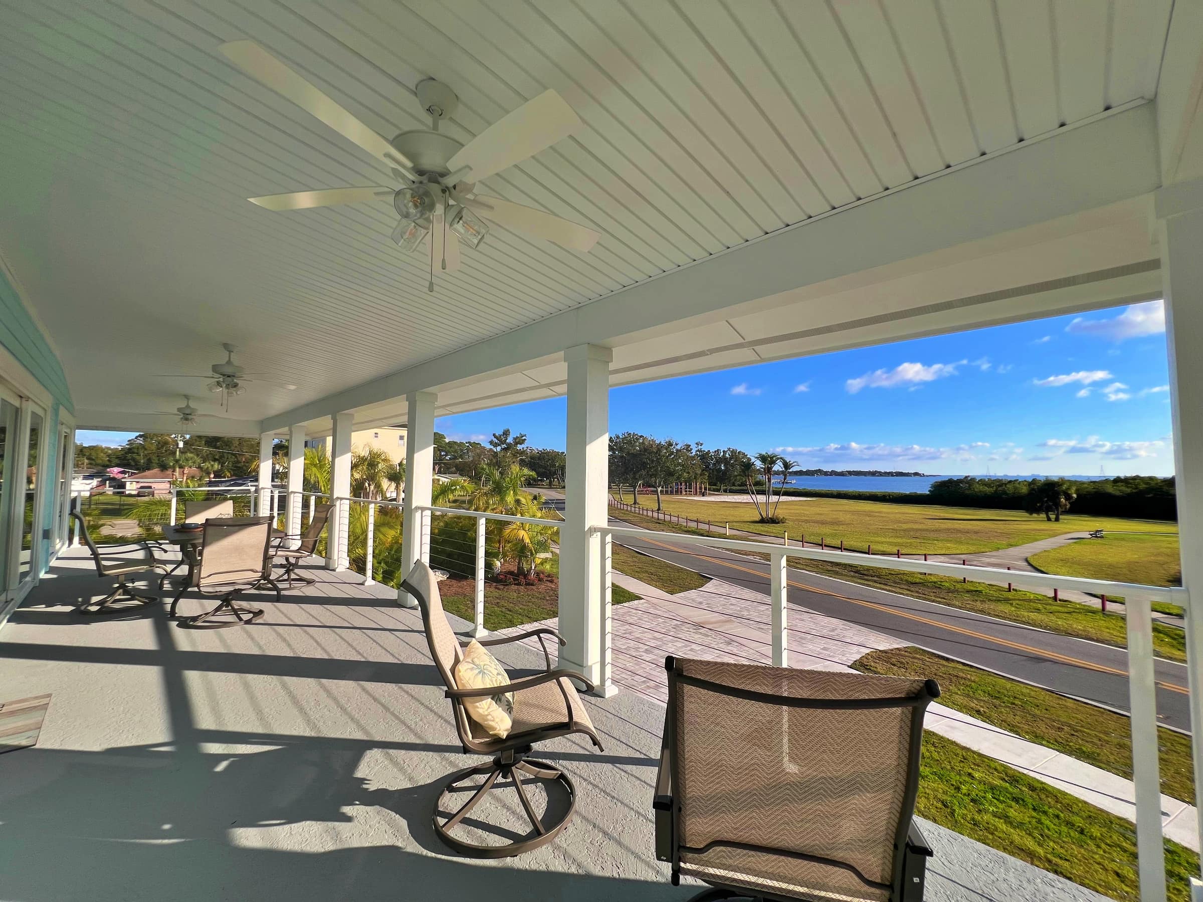 Covered porch looking out over the bay at SkyWater Retreat